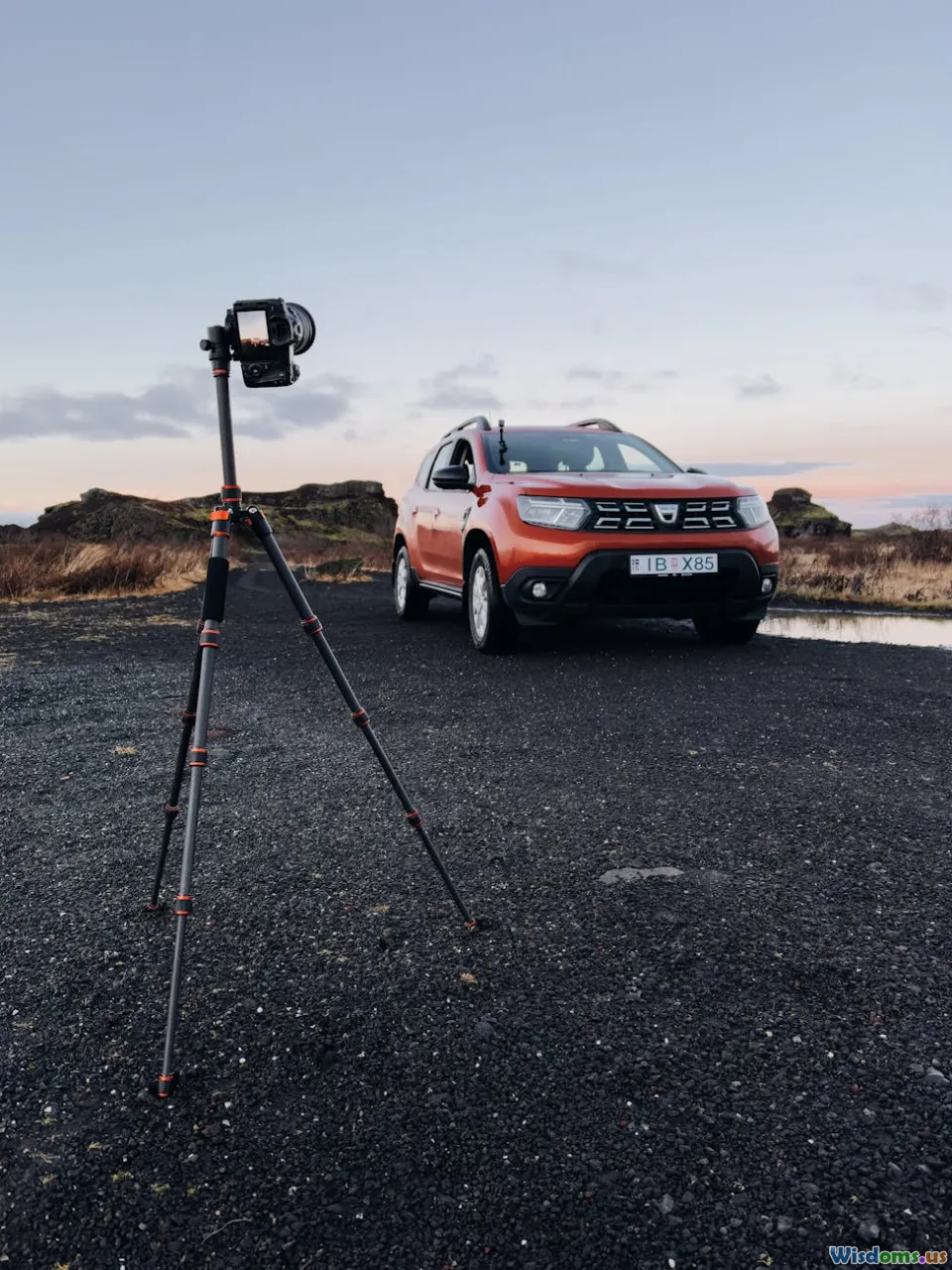 camera on tripod, sunset road, travel journal, landscape photo